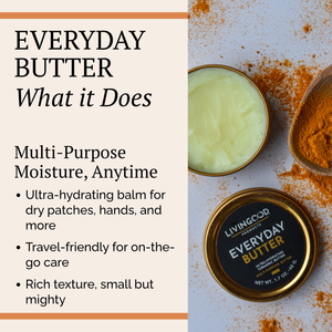 Promotional graphic for Living Good Products Everyday Butter, showing text on the left and product imagery on the right, including an open tin of pale yellow balm, a wooden spoon of orange-brown powder, and a closed round tin with a black and gold label.